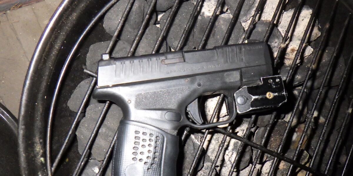 Bullet travels through wall in Springfield apartment, two arrested