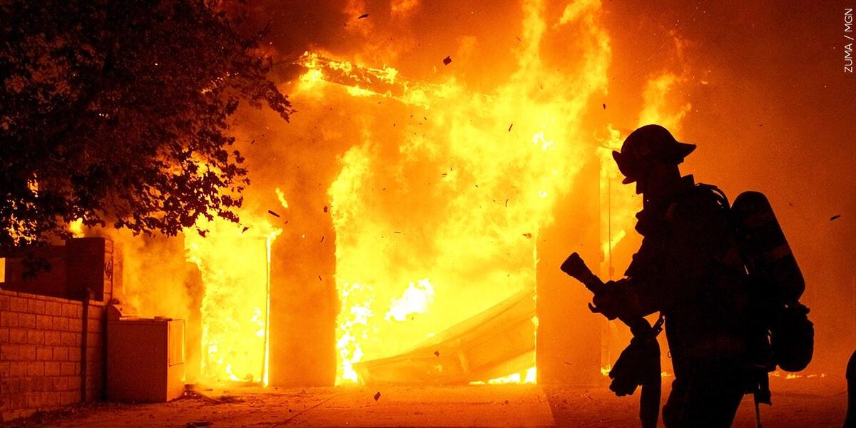 First responders rescue dog from burning house