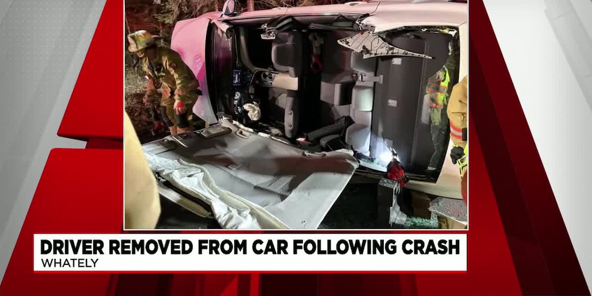Driver rescued from car following collision