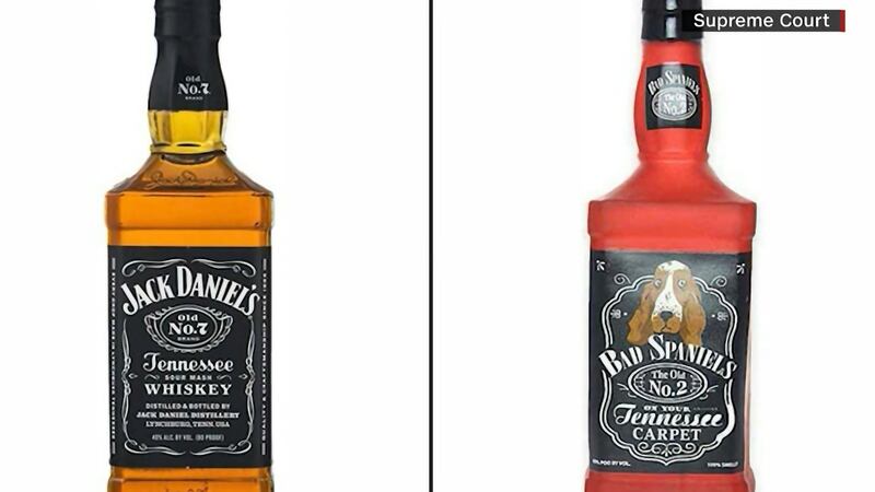 The real bottle says “Jack Daniel's Old No. 7 Tennessee Whiskey." The dog toy parodies that...