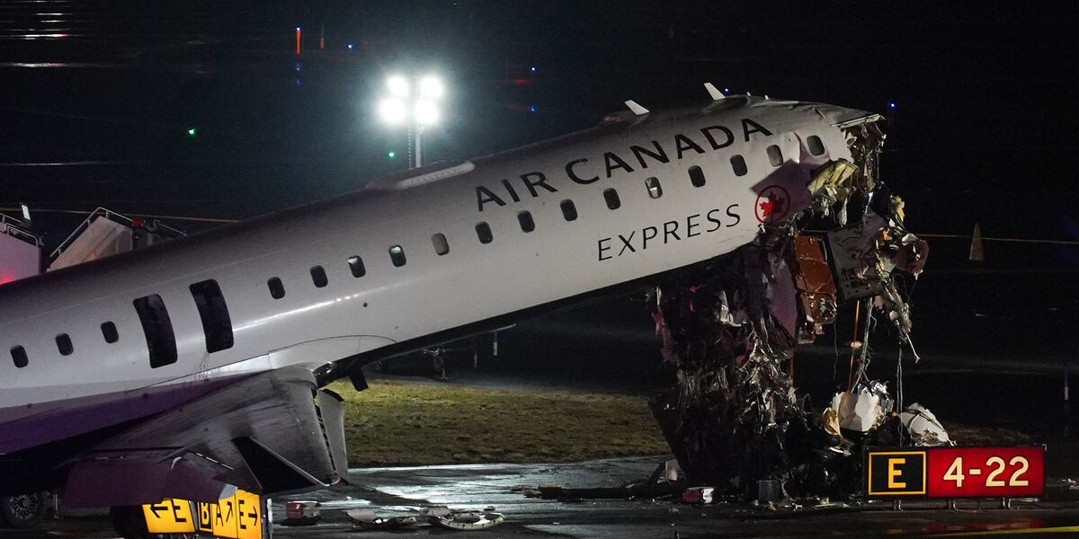 Pilot and copilot killed in collision between jet and fire truck at New York’s LaGuardia Airport