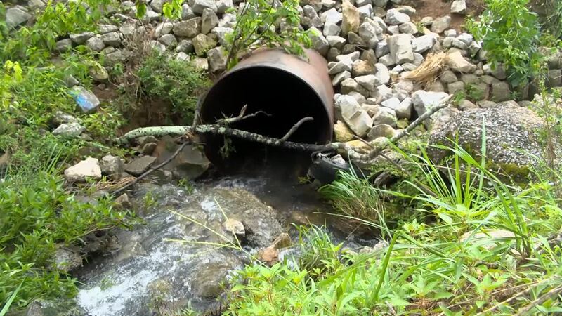Father Drew Owen says he’s lucky to be alive after he was sucked into a storm drain during...