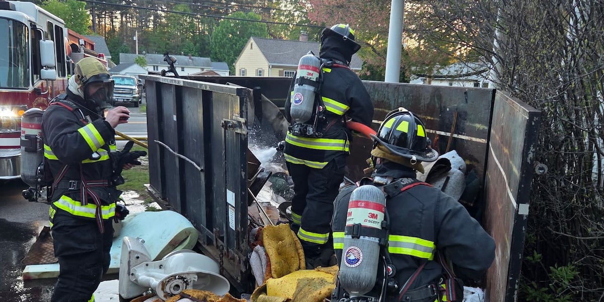 Emergency crews rush to put out dumpster fire