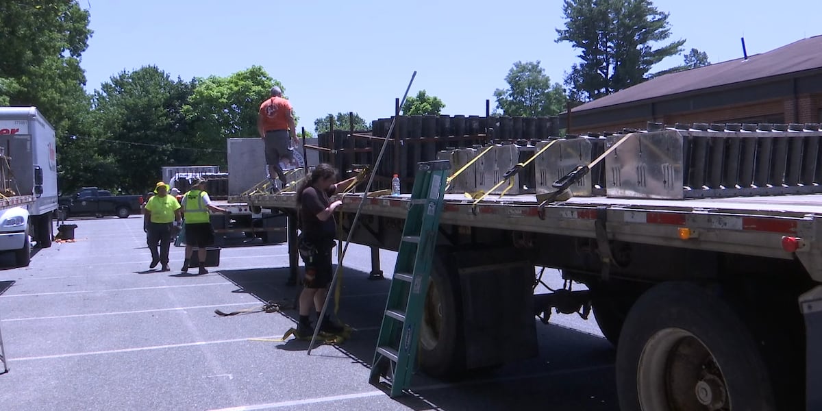 Workers push through the heat to put together Star Spangled Springfield for Independence Day